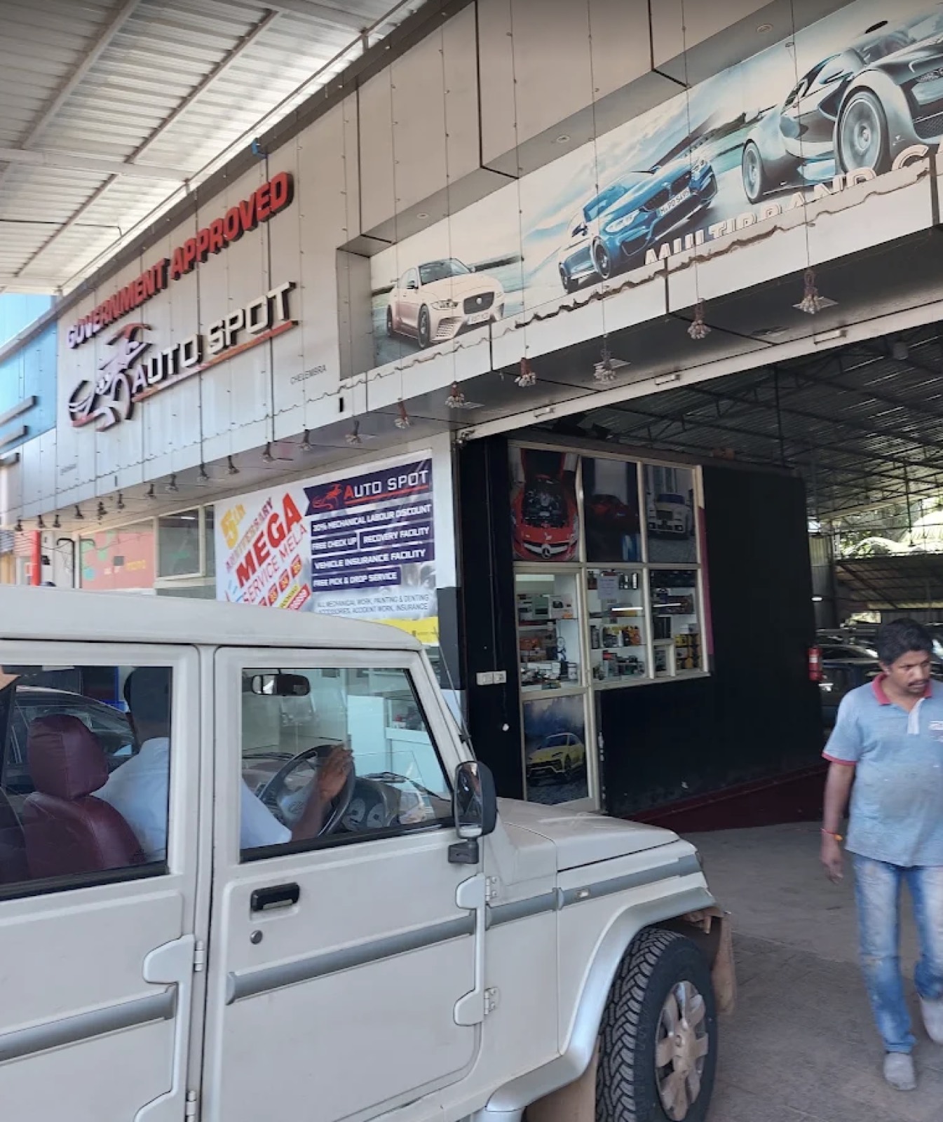 Auto Spot Malappuram workshop frontage with the service counter and spare parts display